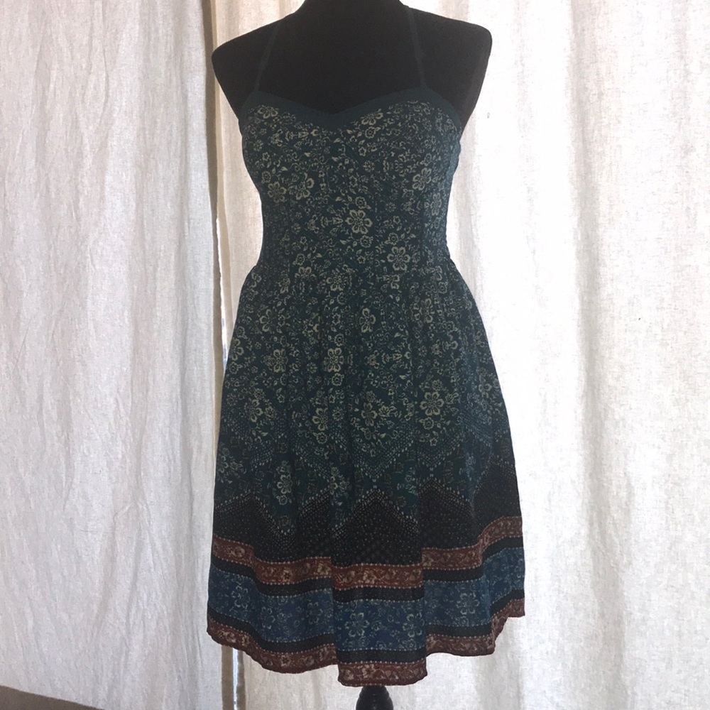 Exhilaration halter-type mid-length dress.
